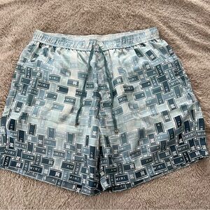 AMIRI Men’s pattern-logo-printed silk shorts | US Large